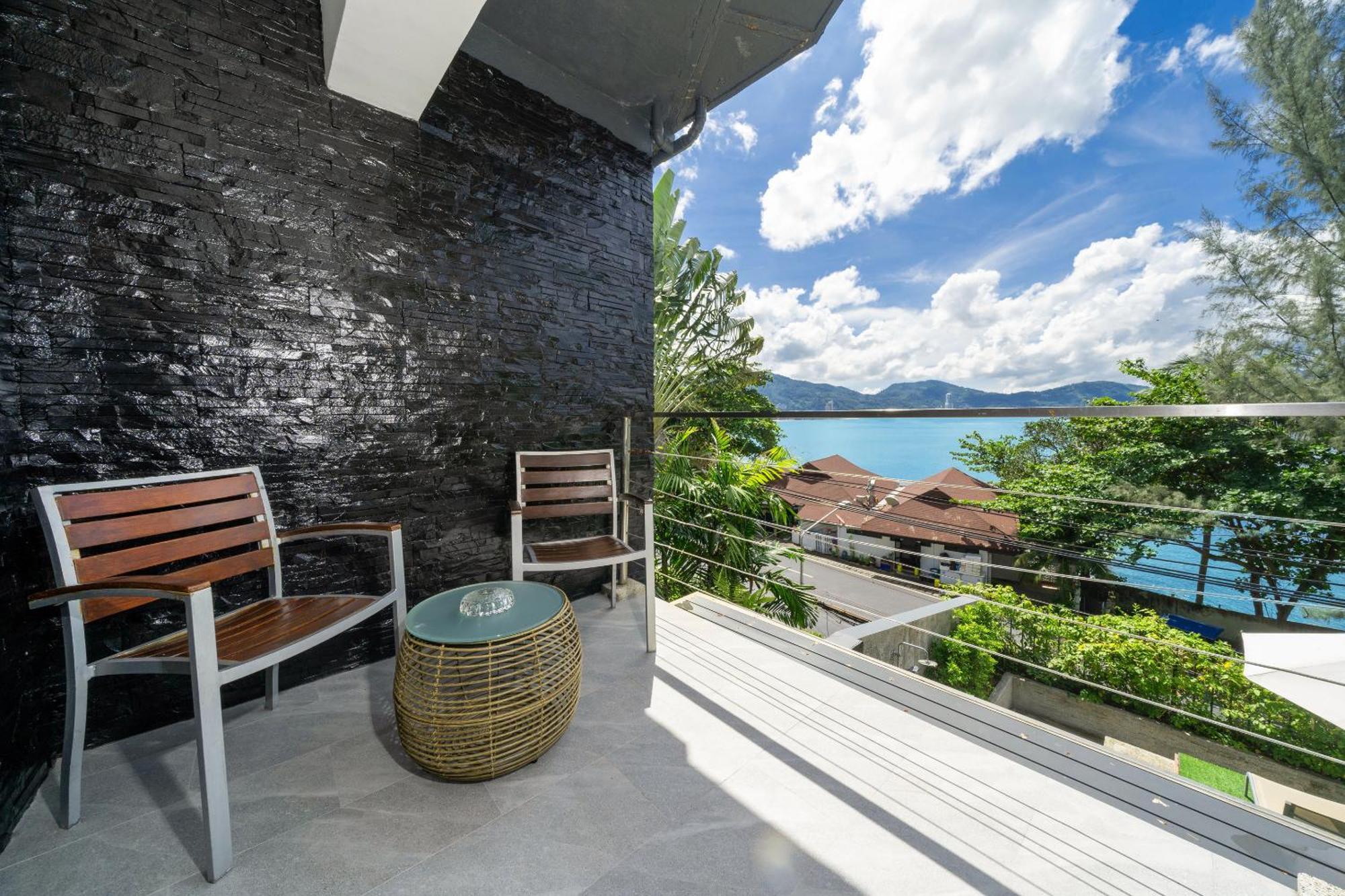 إندوتشين ريزورت آند فيلاز Patong المظهر الخارجي الصورة View from the balcony of a suite at the resort